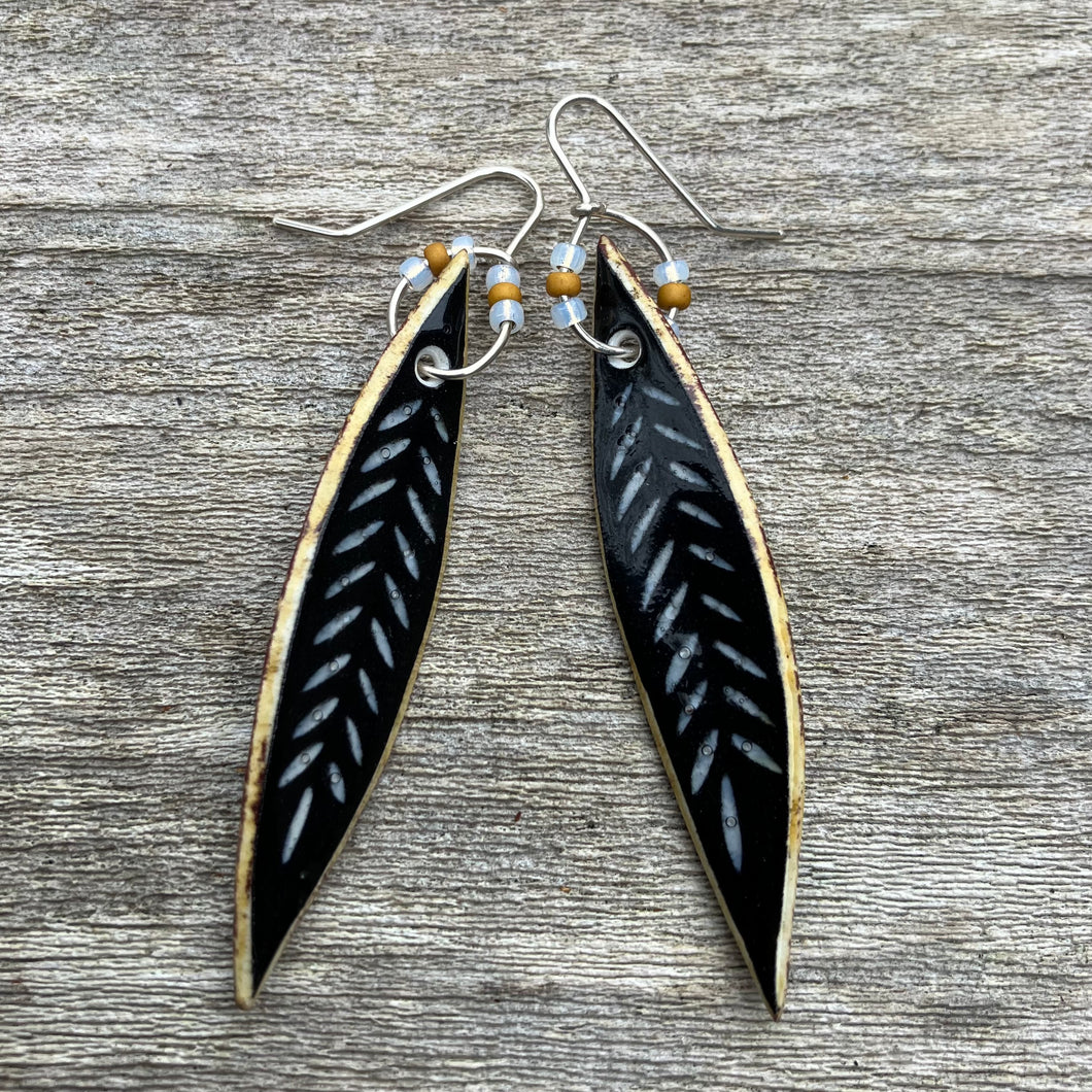 Long black leaf drop